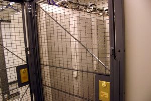 Data center cage with secured and locked servers